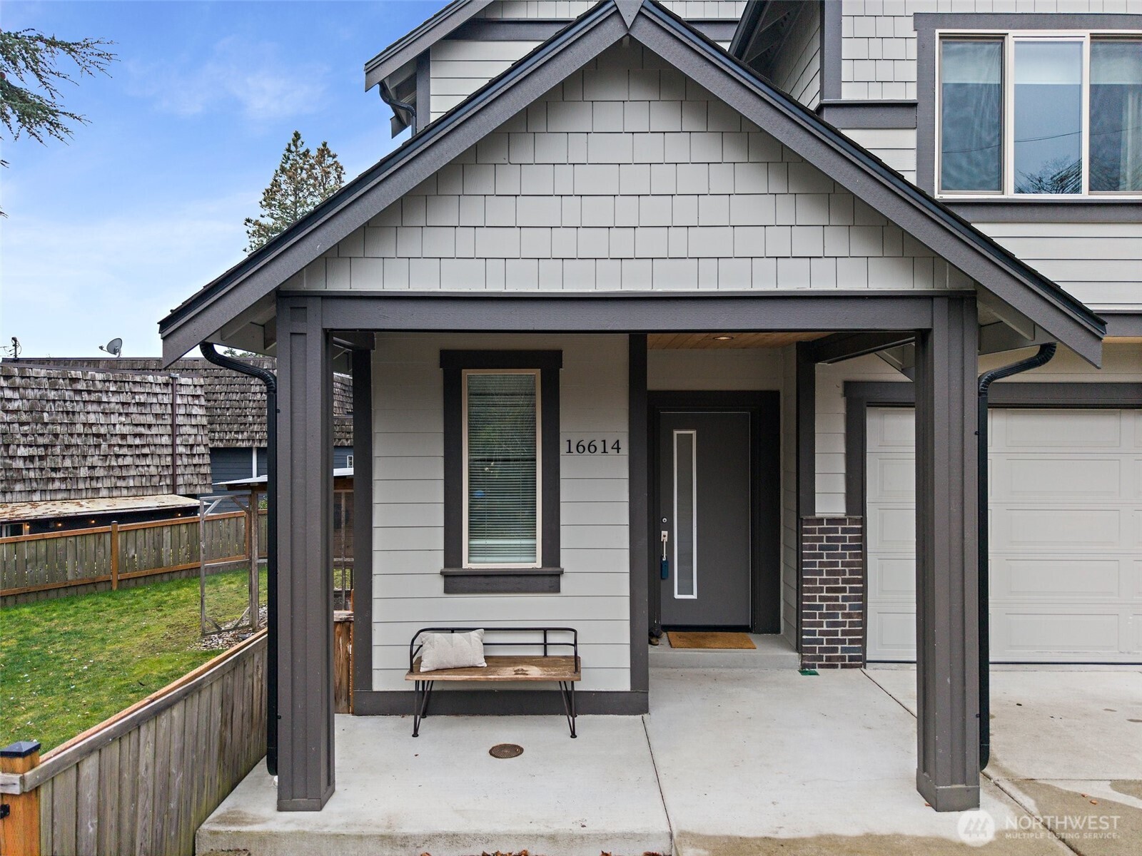 16614 Sylvester Road Southwest Burien, WA 98166 - Photo 5 of 40 a front view of a house with garden