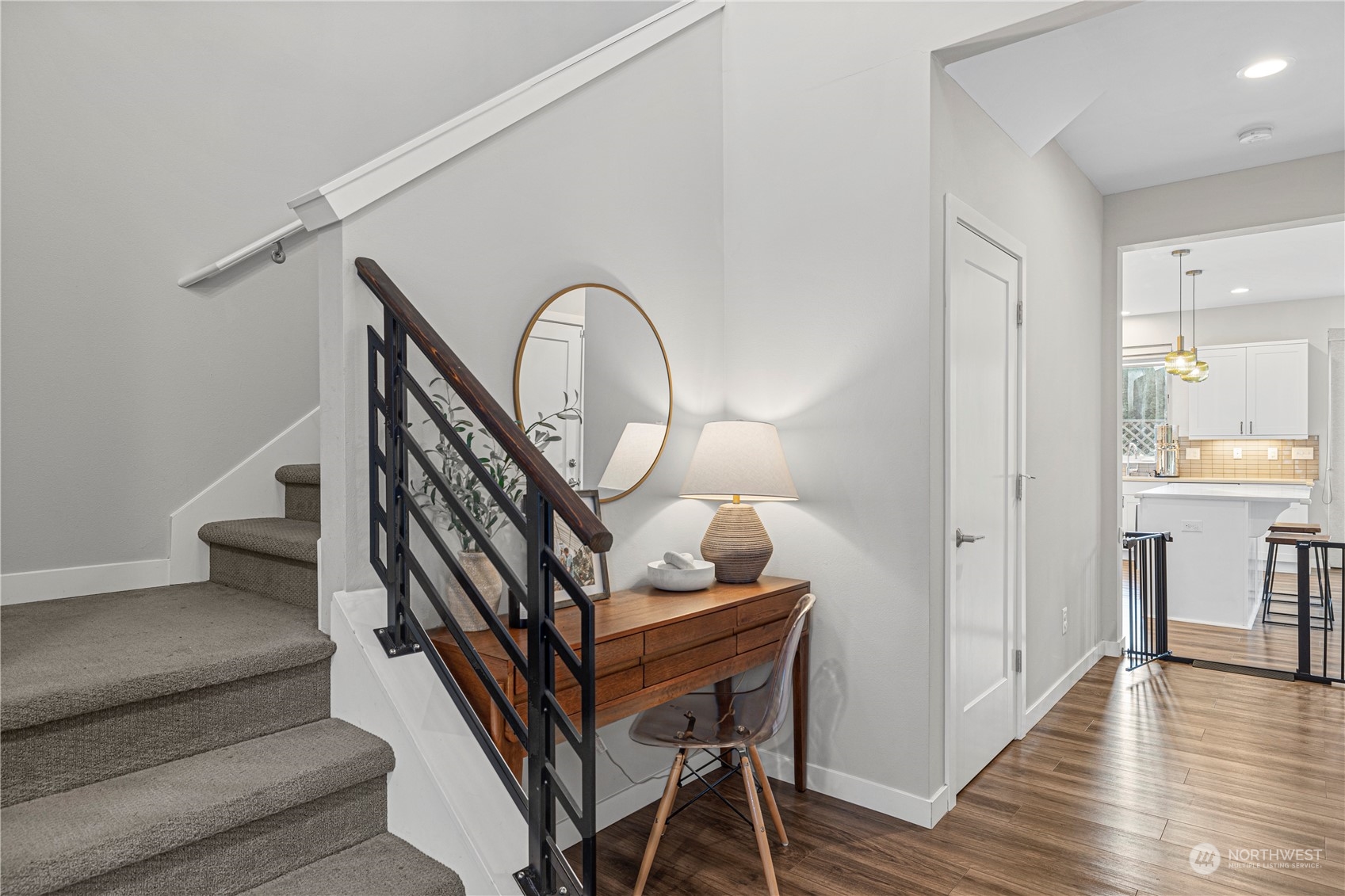 16614 Sylvester Road Southwest Burien, WA 98166 - Photo 6 of 40 a view of entryway and hall with wooden floor