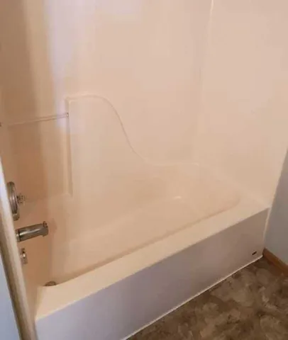 a bathroom with a bathtub