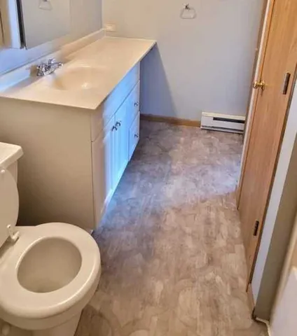 a bathroom with a sink and a toilet