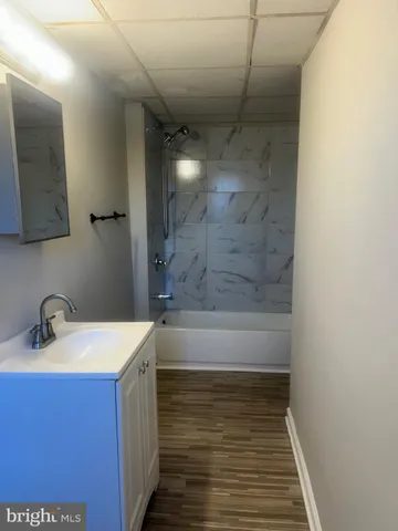 a bathroom with a sink and a bathtub