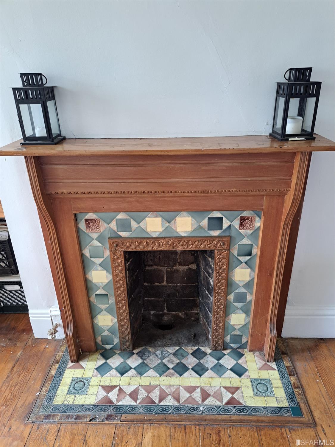 1930 55th Avenue Oakland, CA 94621 - Photo 12 of 25 a view of staircase with a fireplace