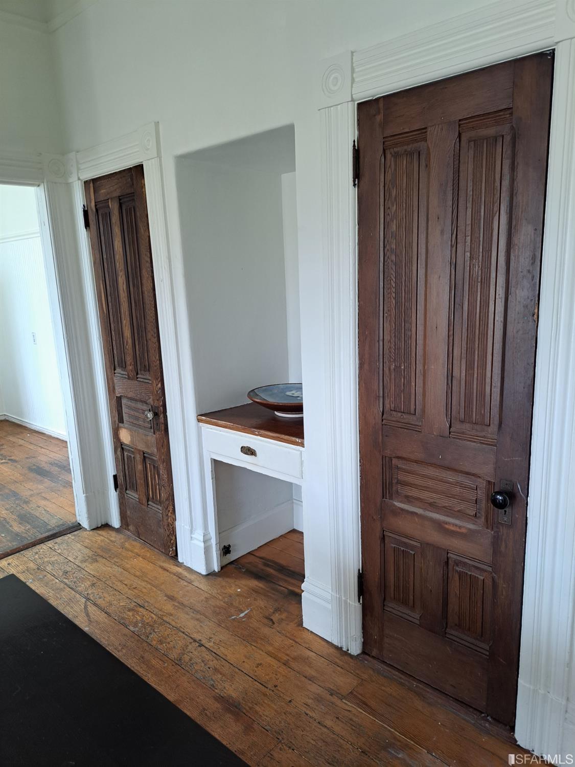 1930 55th Avenue Oakland, CA 94621 - Photo 14 of 25 a room with a wooden floor and furniture