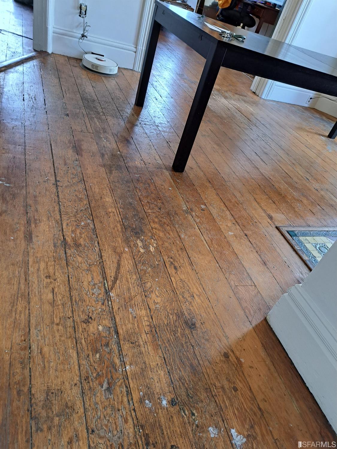 1930 55th Avenue Oakland, CA 94621 - Photo 22 of 25 a view of an empty room and wooden floor