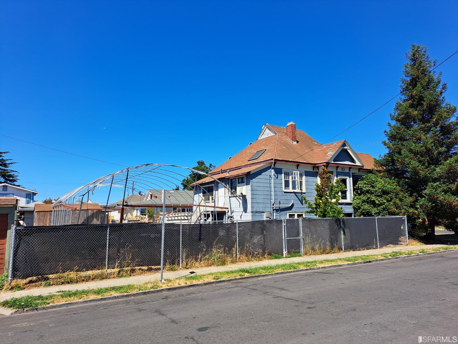 1930 55th Avenue Oakland, CA 94621 - Photo 4 of 25 a view of a house with a swimming pool