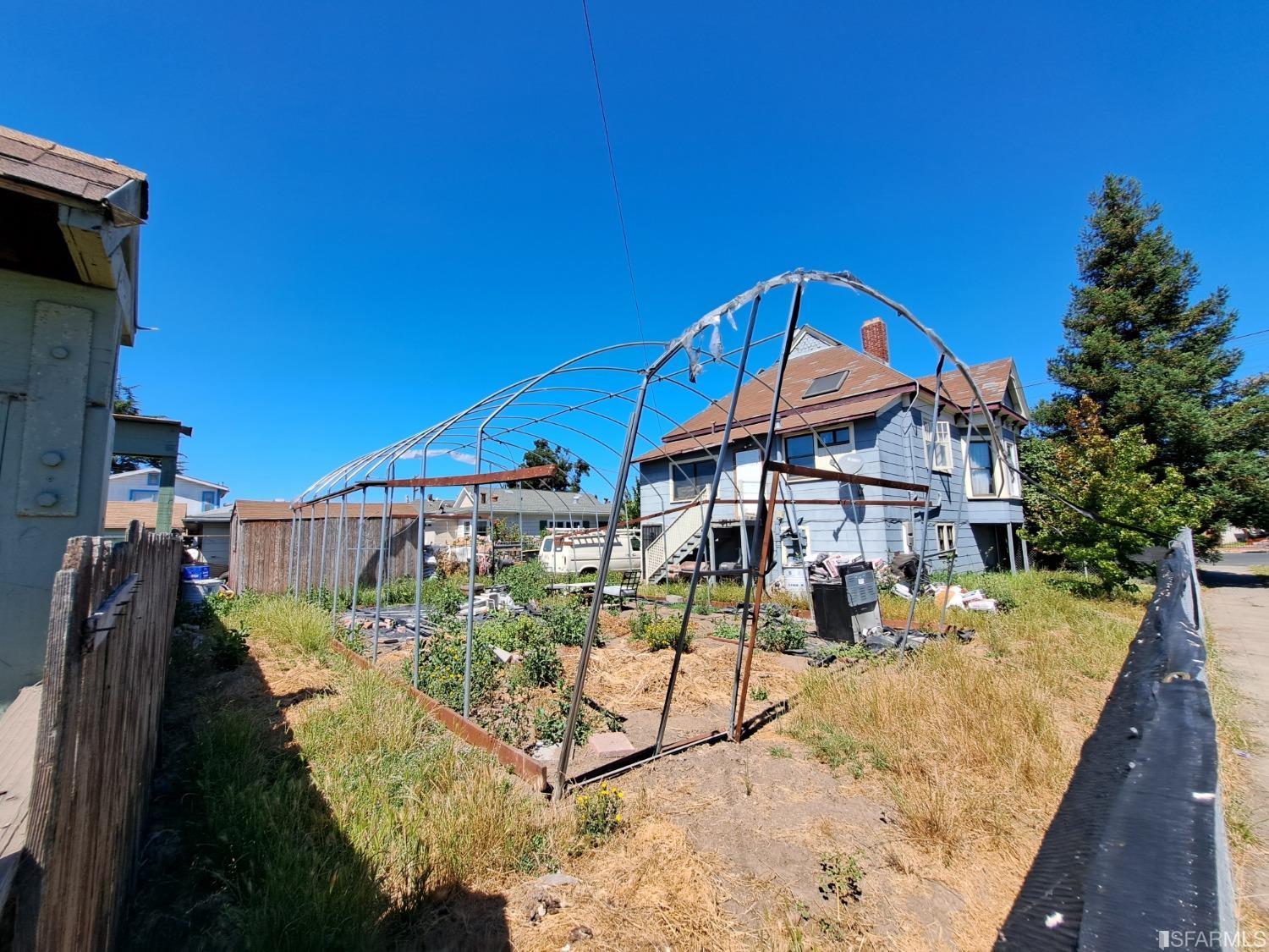 1930 55th Avenue Oakland, CA 94621 - Photo 5 of 25 a view of a house with a yard