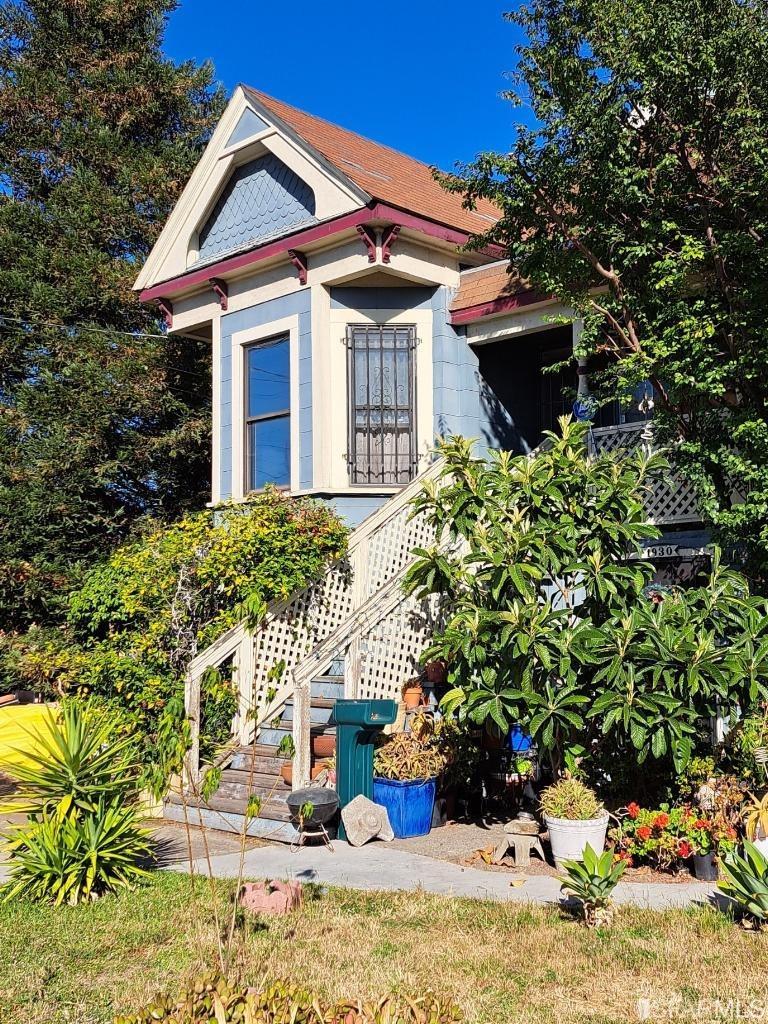 1930 55th Avenue Oakland, CA 94621 - Photo 7 of 25 a front view of a house with a yard