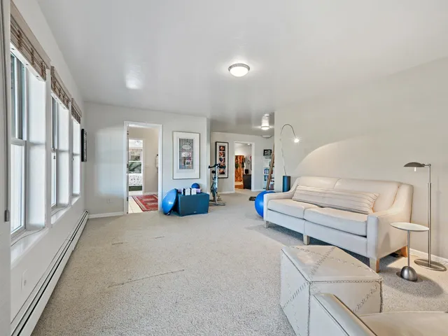 a view of a livingroom with furniture and a couch
