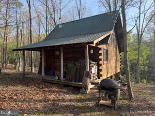 0 Easter Ridge Lane Winchester, VA 22603 - Photo 17 of 17 Charming cabin nestled in serene woods.
