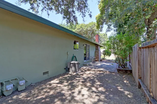 a bathroom with a shower and a door