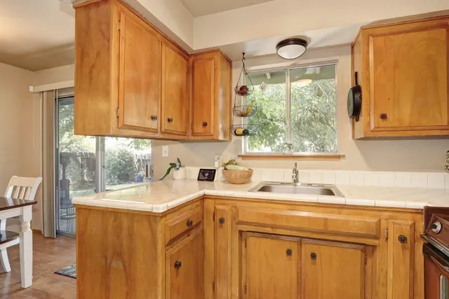 a bedroom with a bed and a lamp