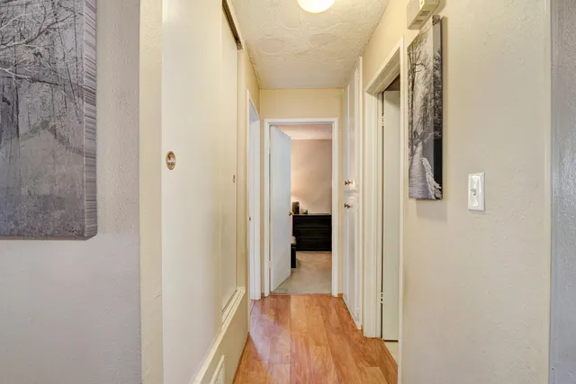 a bedroom with a bed and closet