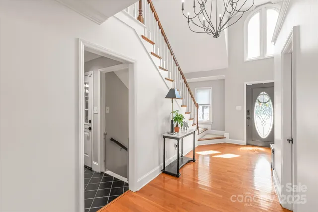 a view of an entryway and wooden floor