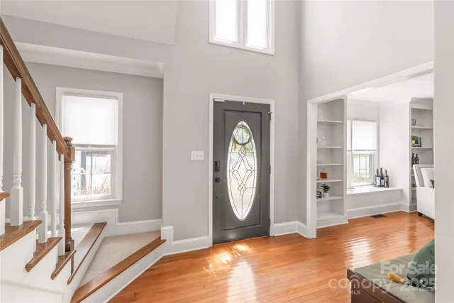 a view of livingroom with furniture wooden floor and window