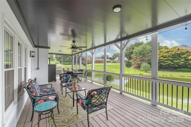 a view of an chairs and table in the balcony