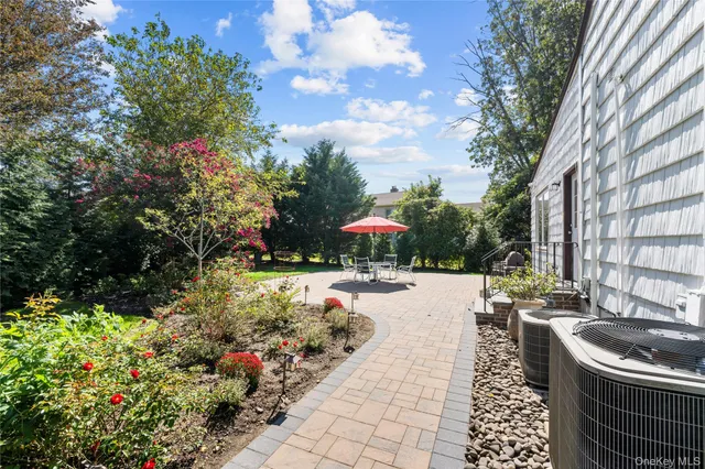 a view of a chairs and tables in the patio