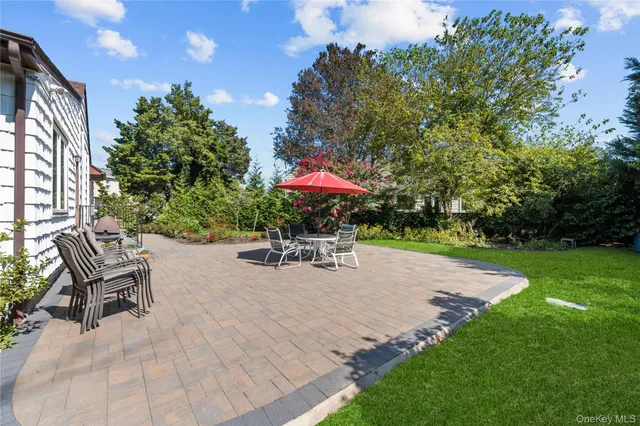 a garden view with a seating space