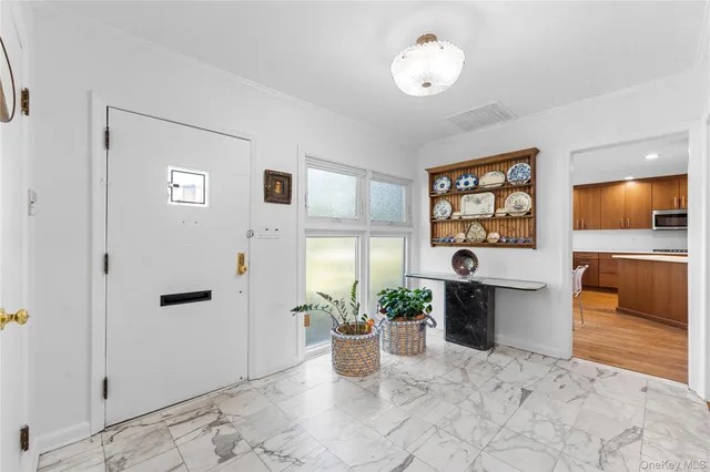 a view of a living room and window