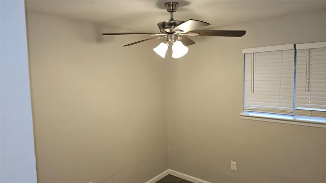 a view of a small space with a fan