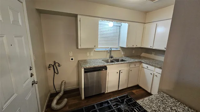 a kitchen with a sink stove and refrigerator