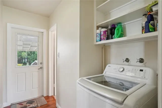 a utility room with washer and dryer