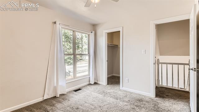 4485 Beaumont Road Colorado Springs, CO 80916 - Photo 15 of 28 Upper Bedroom with Walk In Closet