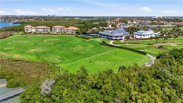 an aerial view of ocean residential houses with outdoor space and ocean view