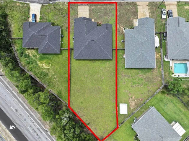 aerial view of a house with swimming pool