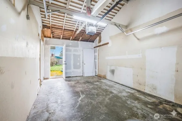 a view of a room with a wooden floors