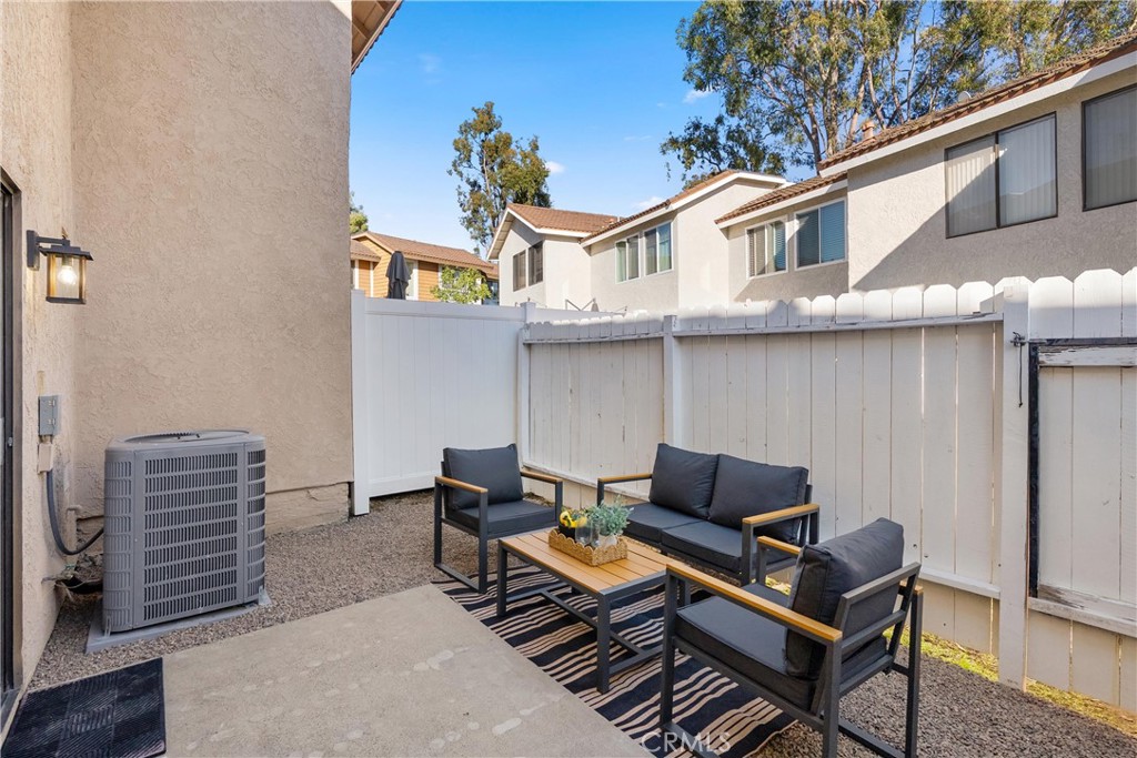 25885 Trabuco Road, Unit 91 Lake Forest, CA 92630 - Photo 16 of 36 a building outdoor space with patio furniture