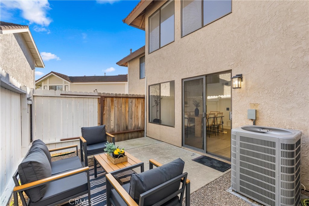 25885 Trabuco Road, Unit 91 Lake Forest, CA 92630 - Photo 17 of 36 a backyard of a house with seating space