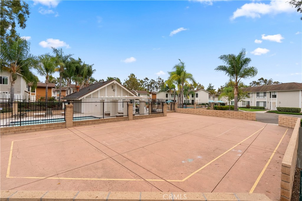 25885 Trabuco Road, Unit 91 Lake Forest, CA 92630 - Photo 31 of 36 a view of outdoor space and tennis court