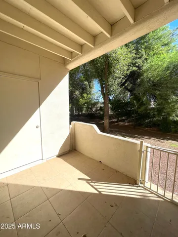 a view of a balcony with a sink