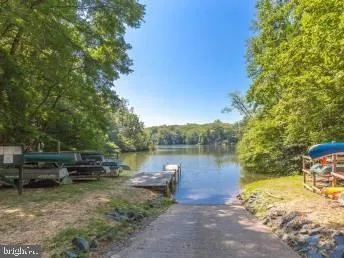 a view of a lake with sitting area