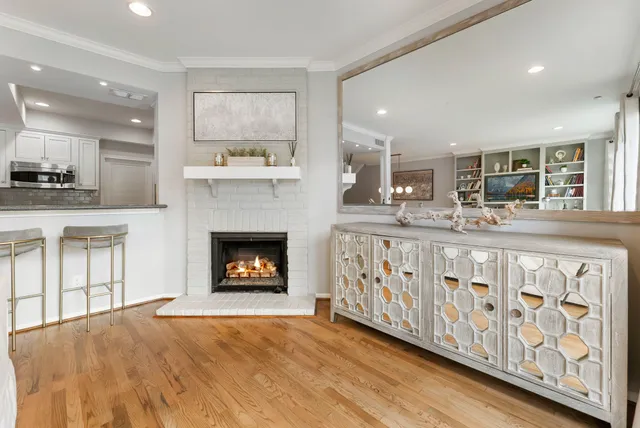 a kitchen with stainless steel appliances granite countertop a stove and a wooden cabinets