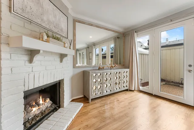 a view of a fireplace in an empty room