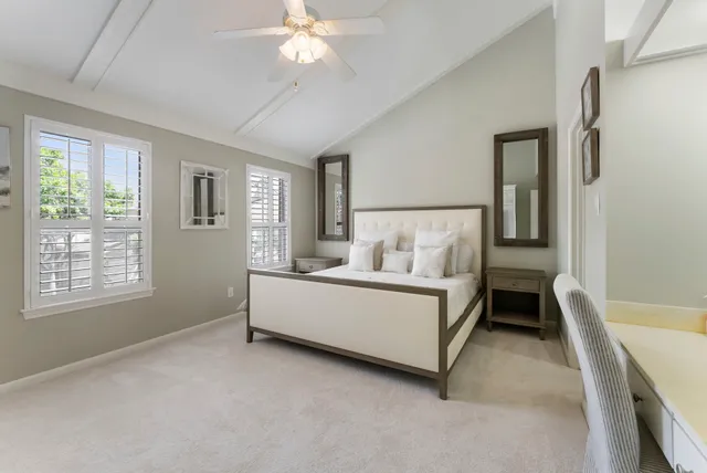 a room with a bed and a window