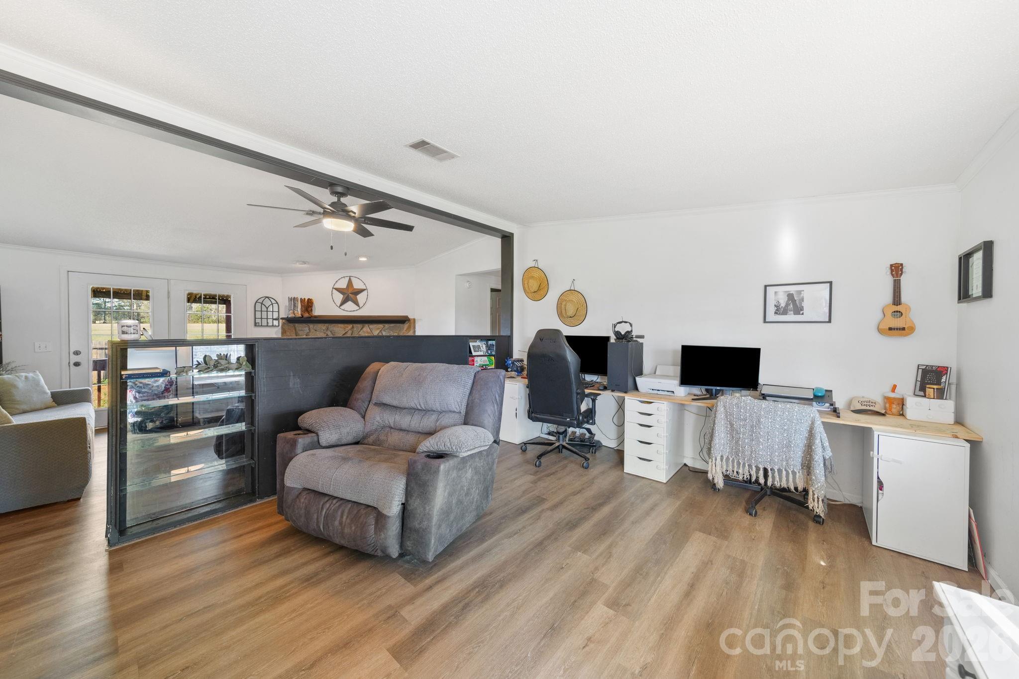 139 Old Fallston Road Cherryville, NC 28021 - Photo 13 of 47 a living room with furniture and a flat screen tv