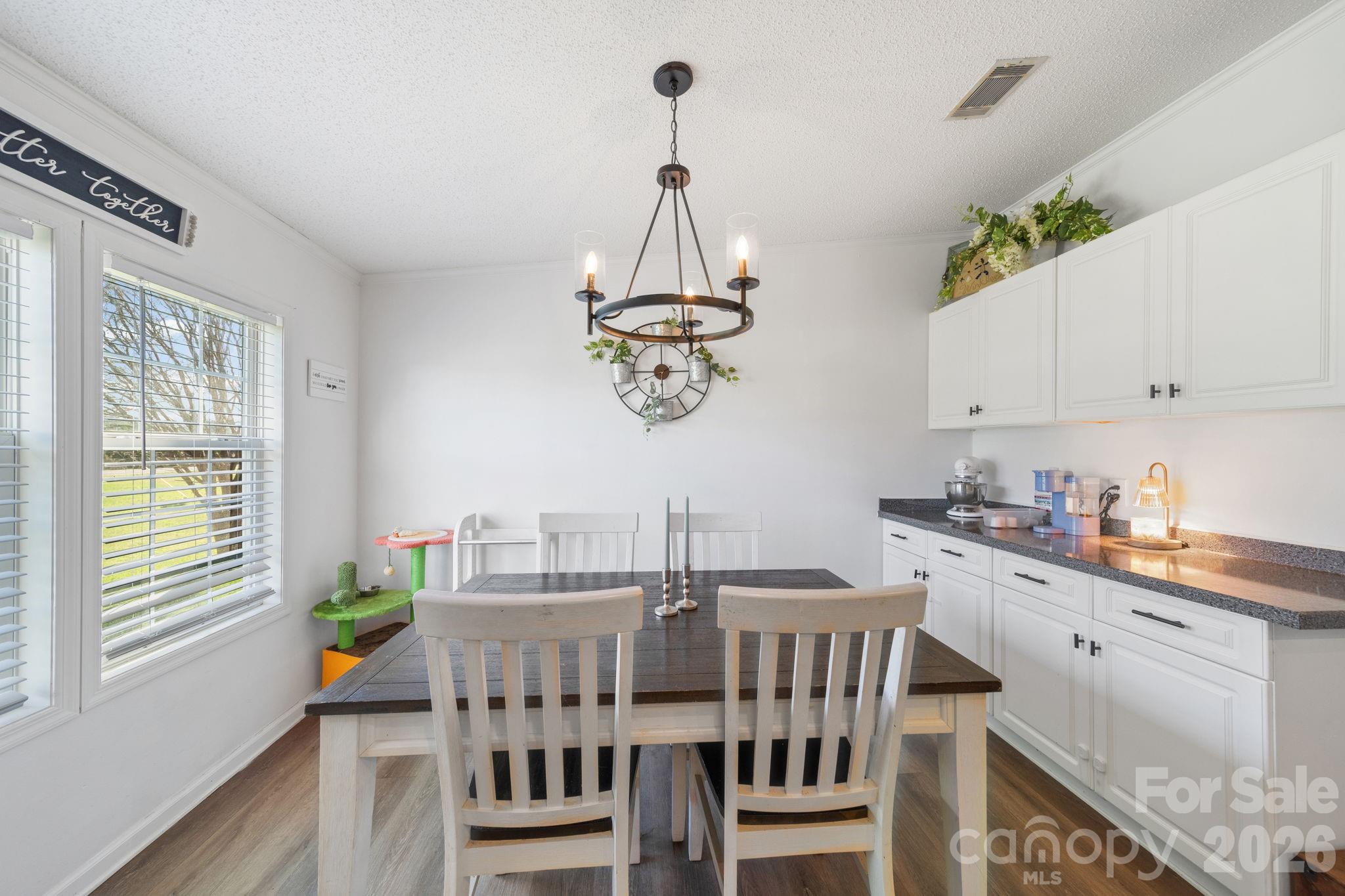 139 Old Fallston Road Cherryville, NC 28021 - Photo 26 of 47 a view of a dining room with furniture window and outside view