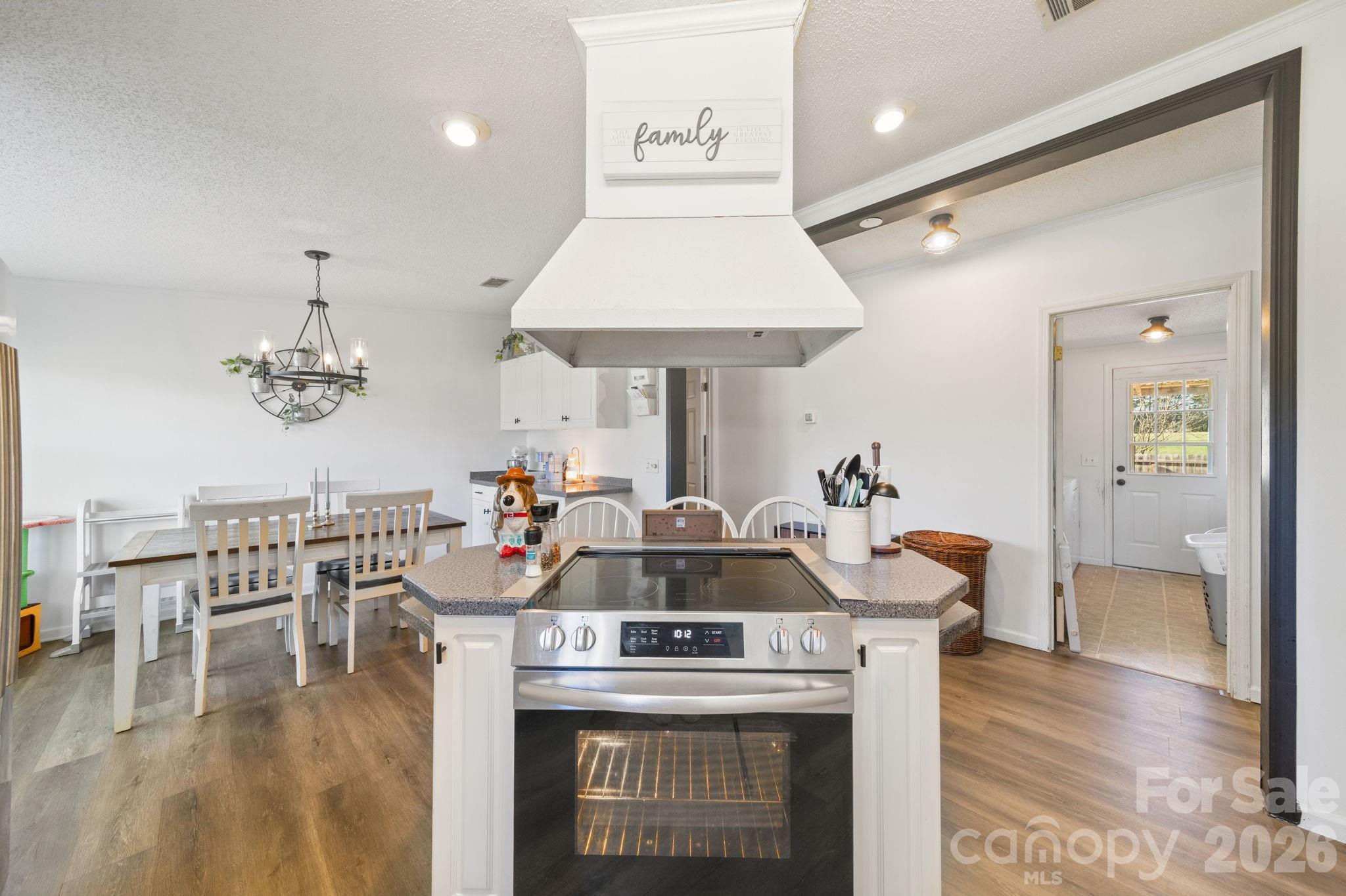 139 Old Fallston Road Cherryville, NC 28021 - Photo 31 of 47 a view of living room with furniture and wooden floor