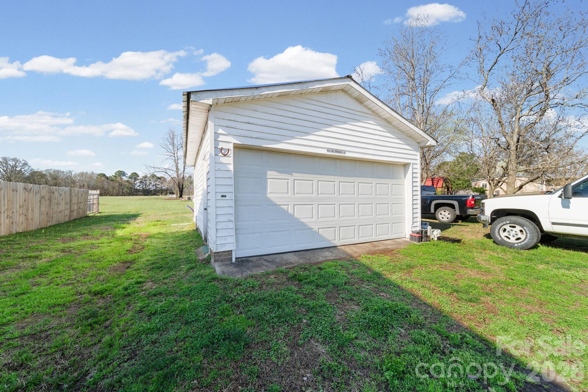 139 Old Fallston Road Cherryville, NC 28021 - Photo 39 of 47 a view of a house with a back yard