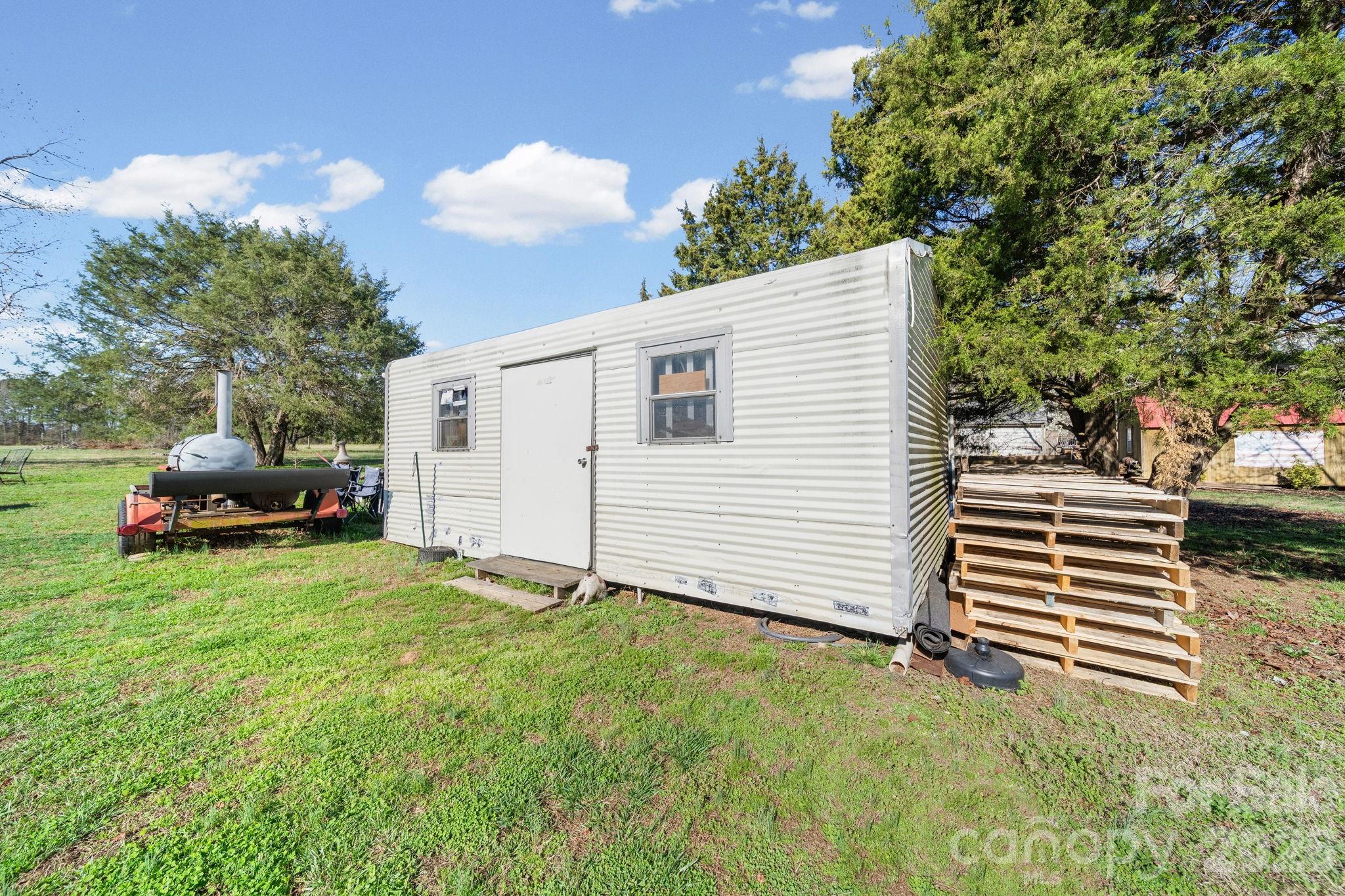139 Old Fallston Road Cherryville, NC 28021 - Photo 40 of 47 a view of a back yard of the house