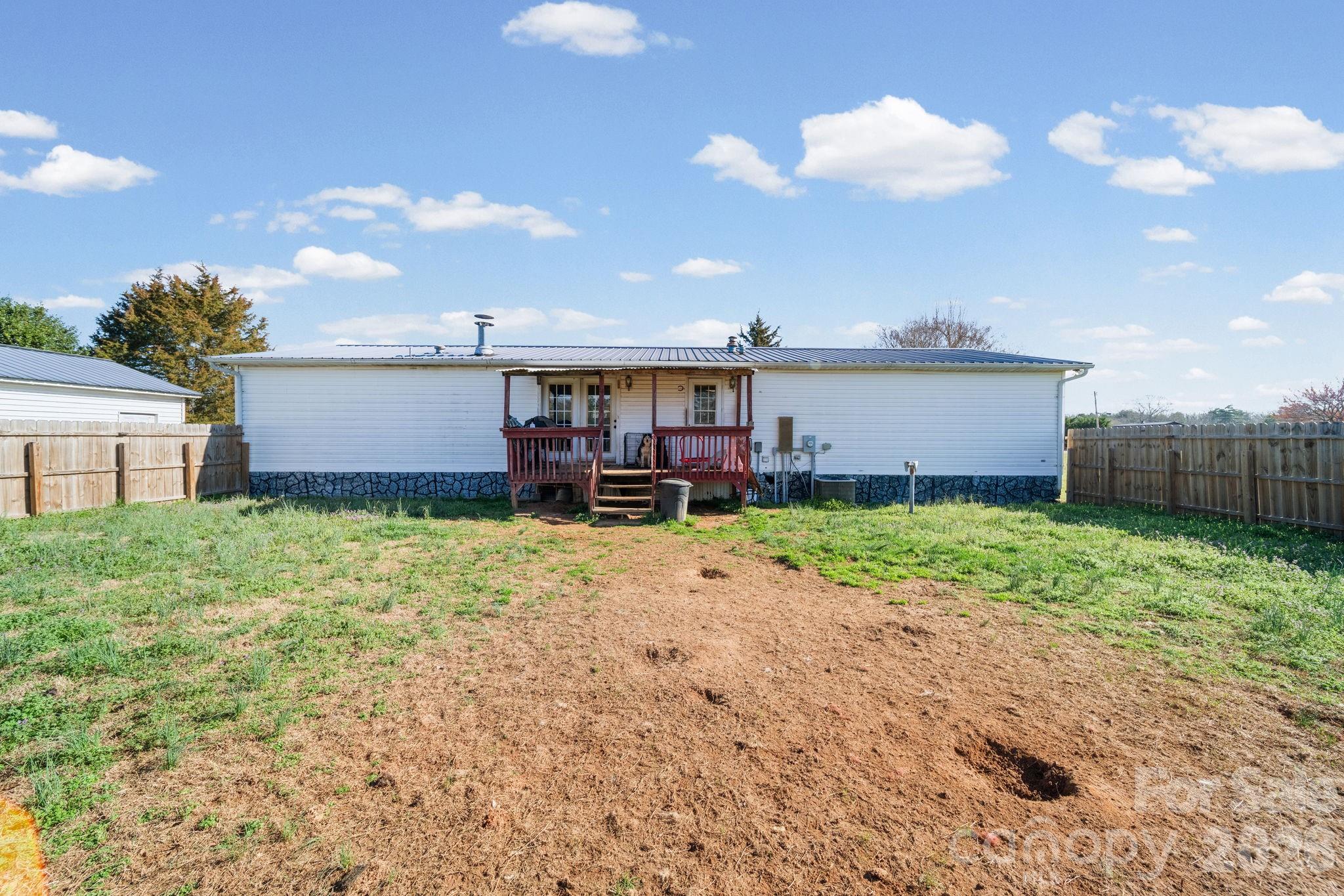 139 Old Fallston Road Cherryville, NC 28021 - Photo 43 of 47 a house view with a garden space