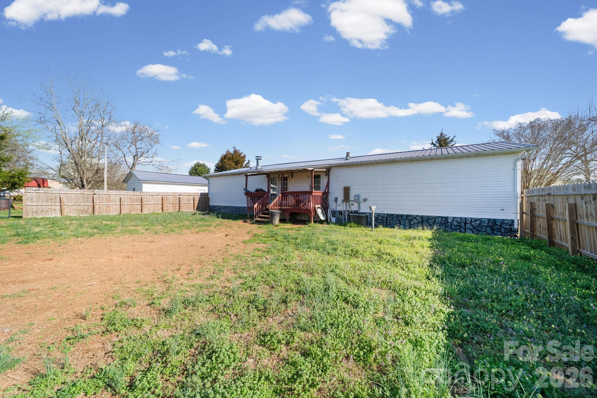 139 Old Fallston Road Cherryville, NC 28021 - Photo 44 of 47 a house view with a garden space