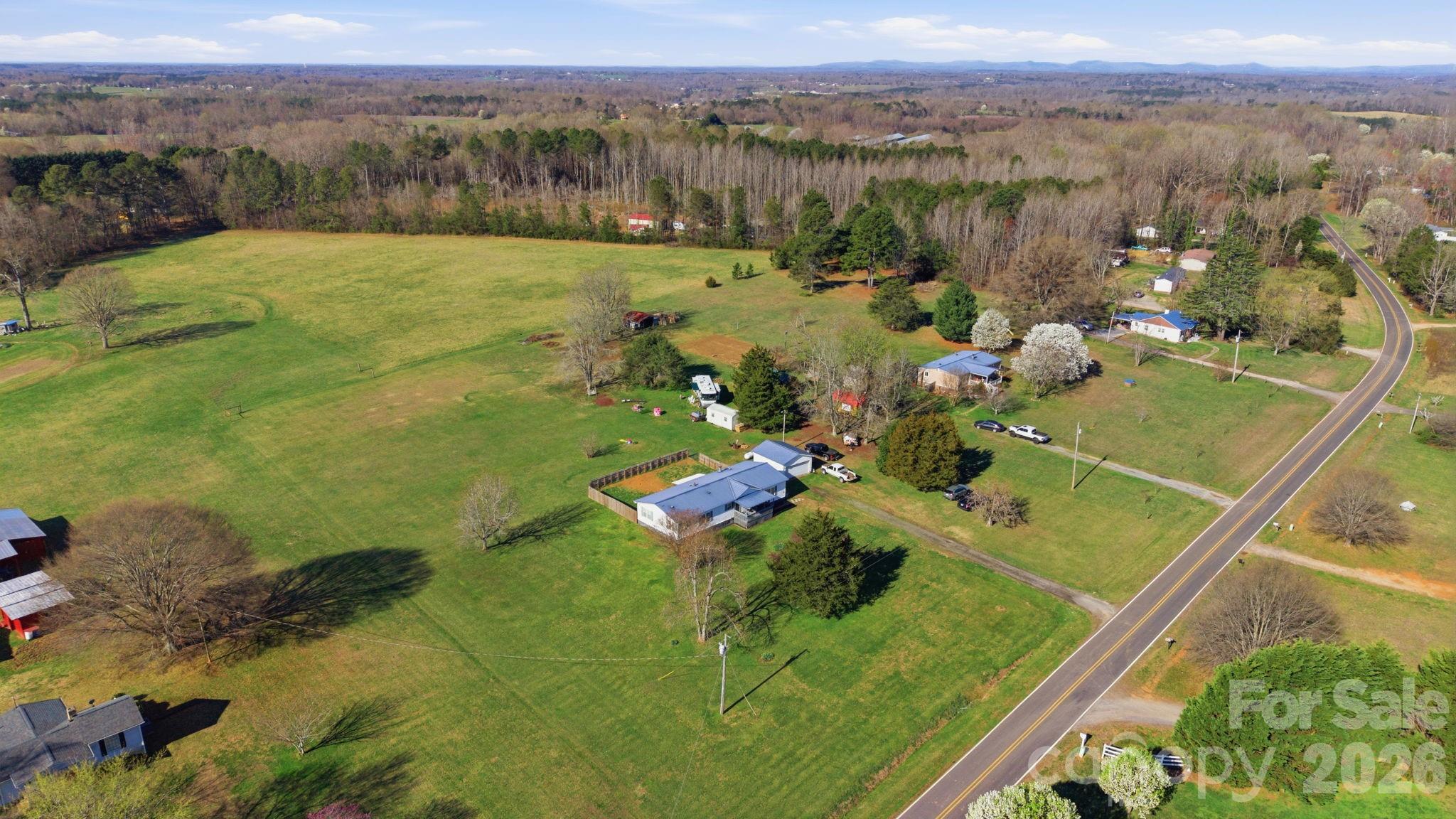 139 Old Fallston Road Cherryville, NC 28021 - Photo 5 of 47 a view of a lake with a mountain