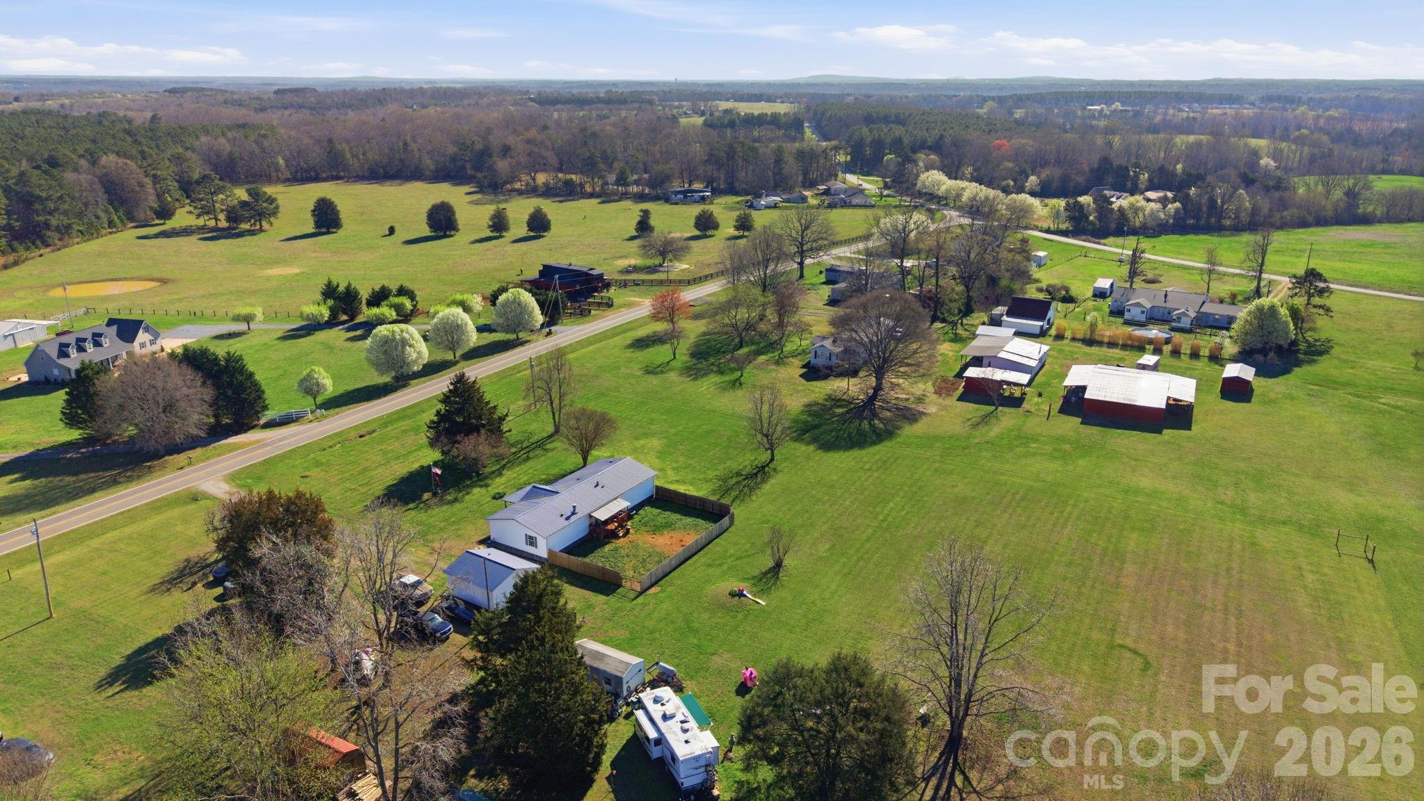 139 Old Fallston Road Cherryville, NC 28021 - Photo 8 of 47 an aerial view of a house with a garden