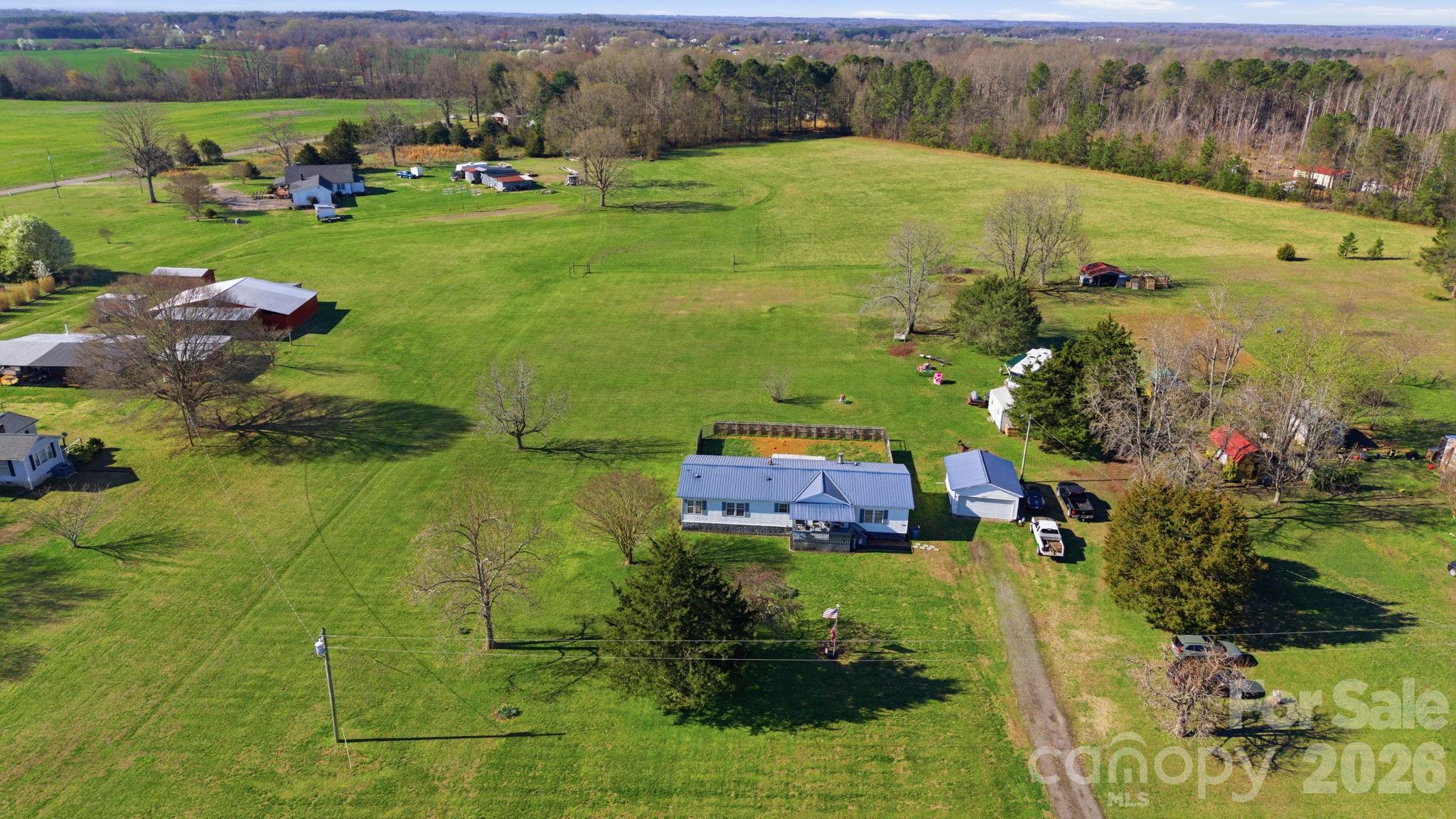 139 Old Fallston Road Cherryville, NC 28021 - Photo 10 of 47 a view of a garden with an outdoor space