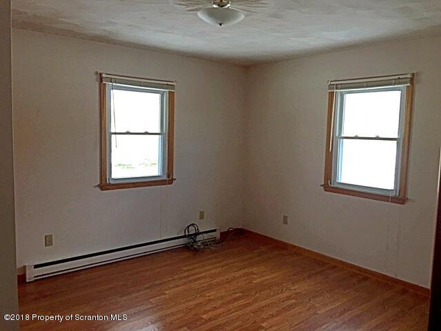1668 Pennay Hill Road Kingsley, PA 18826 - Photo 15 of 23 an empty room with a window