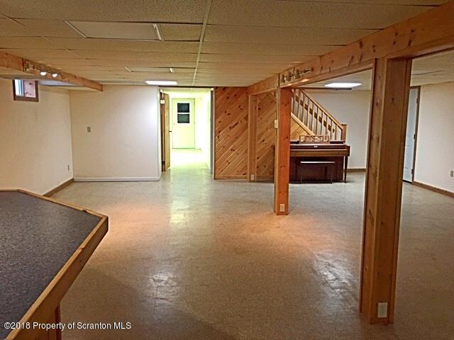 1668 Pennay Hill Road Kingsley, PA 18826 - Photo 19 of 23 a view of a livingroom with a staircase