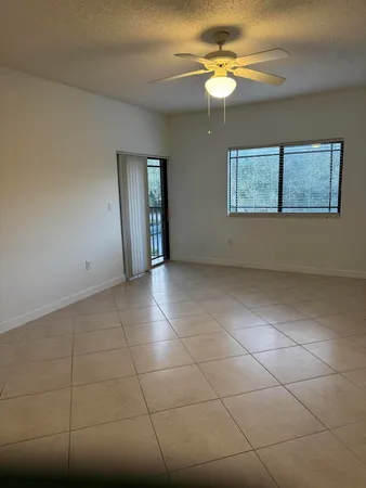 a view of a kitchen with a sink and dishwasher